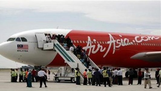 pesawat air asia mendarat terakhir